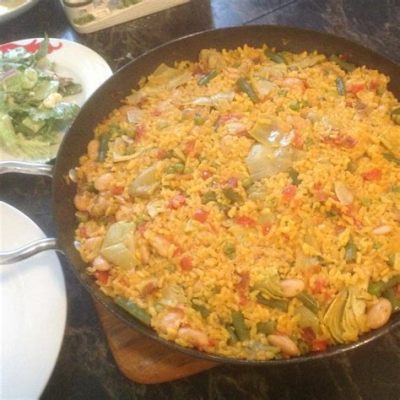   Paella Valenciana: Mausteinen Riisiherkku Kuin Auringon Lämmittelemä Aurinkoinen Rannat